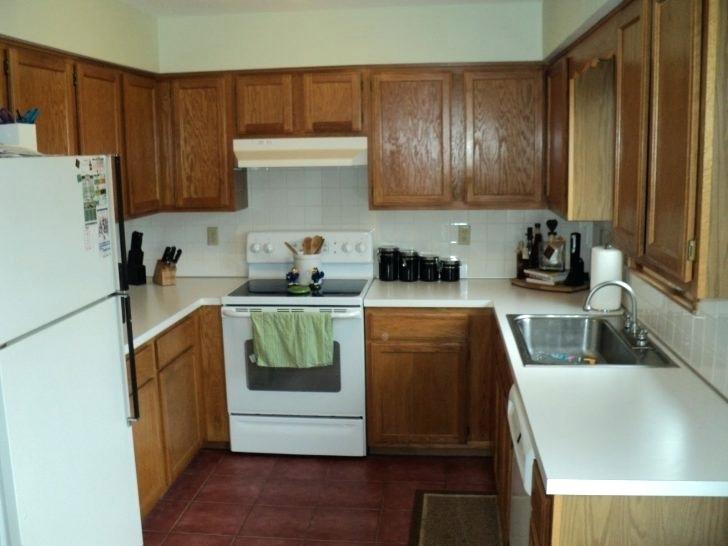 dark brown kitchen walls light brown kitchen walls dark white cupboards with black grey cabinets wood floors kitchens appliances dark brown kitchen wall tiles