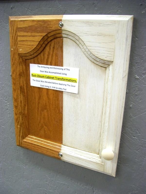 white distressed kitchen cabinets here a clever and easy way to create a antique finish on your kitchen cabinets starting with rust cabinet transformations how to make white kitchen cabinets look dist