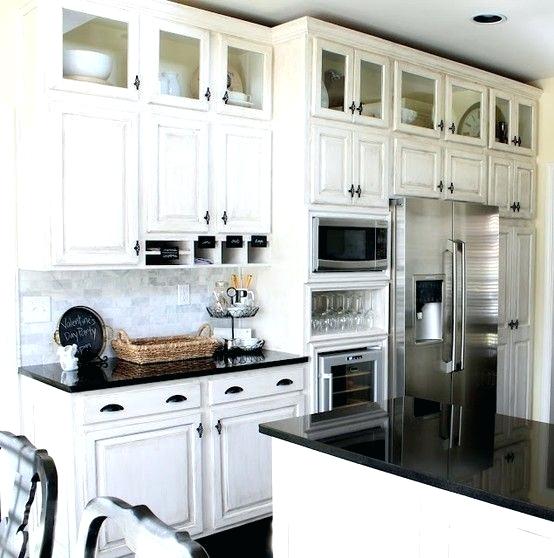 kitchen cabinets above microwave mini kitchen makeover they took out a tall cabinet that working for them and used the space for a built in microwave wine glass storage beverage kitchen cabinets micro