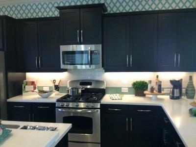 kitchen cabinets above microwave mocha shaker kitchen with bumped out wall cabinet above the microwave creates a staggered look kitchen cabinets microwave oven